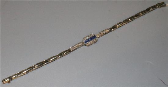 A 9ct white gold, sapphire and diamond bracelet.